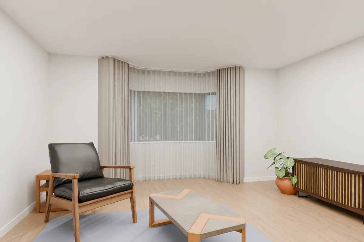 A lined curtain and a sheer on a track that follows a bay window