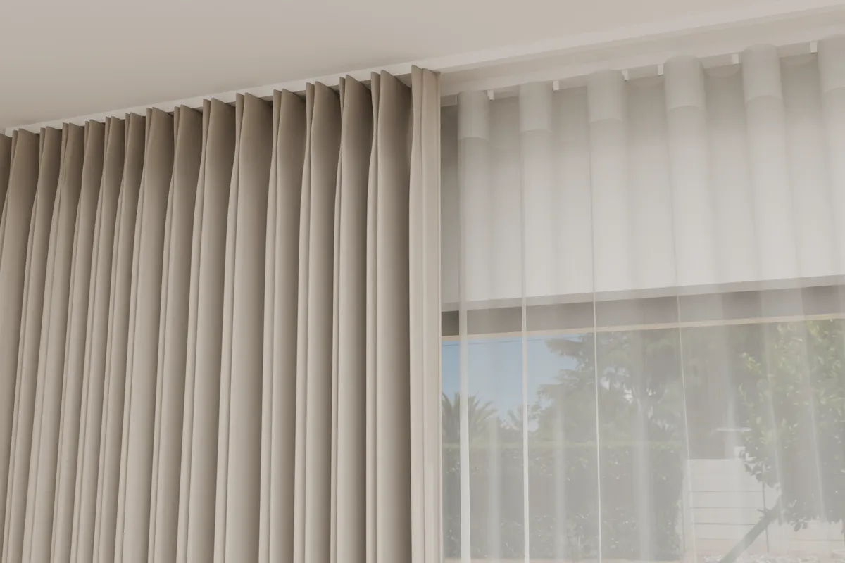 The top of a pinch pleat curtain close up, with the heading outlined
